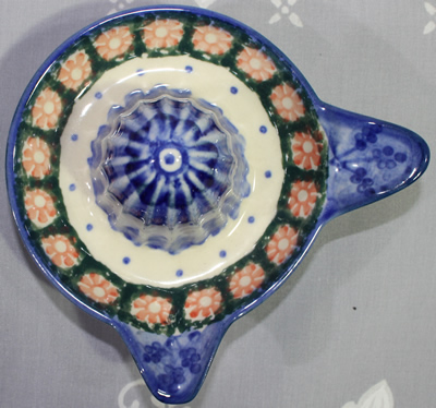 Top view of small pink flower Polish juicer