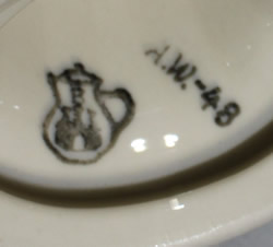Basemark on an Artistic Ceramics ( Poland) dark blue polka dots on white ceramic juicer