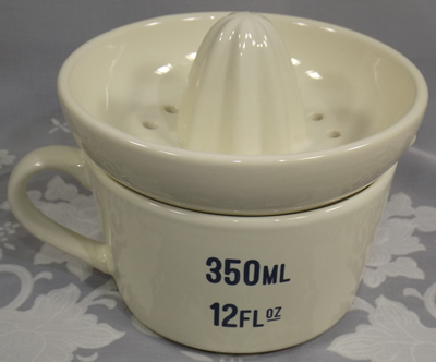 back of Mason Cash Varsity juicer with measuring jug