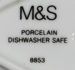 A different basemark and on a white 'gravy jug' like ceramic juicer