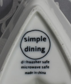 A different basemark and on a white 'gravy jug' like ceramic juicer