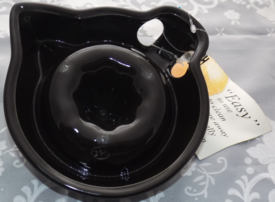 Base of a black Australian 'JH' ceramic juicer