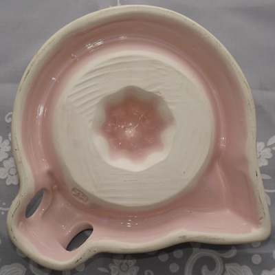A second base example of a pink Australian 'JH' ceramic juicer