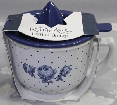 A packaged Katie Alice blue and white Lemon Juicer