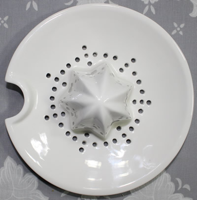 The reamer for a white with indigo base Ecology ceramic juicer