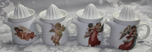 The set of four 2 piece nymph teapot juicers
