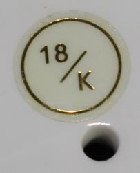Base label on a white 18/K ceramic deep jug juicer