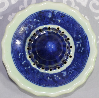 Reamer for a Victoria Ware blue and white ceramic juicer