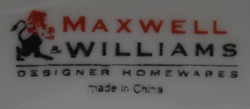 Basemark on a large Maxwell Williams white loop handle ceramic juicer