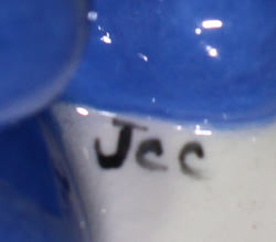 Jcc potter's mark on NRCA 2005 light blue boy ceramic juicer