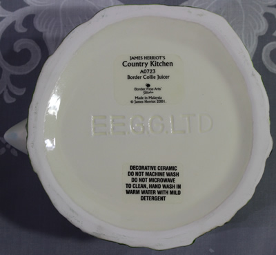 Base of a border collie ceramic juicer