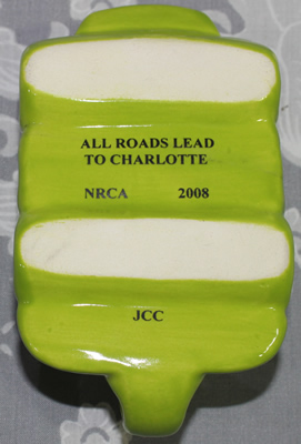 Base of green NRCA 2009 car ceramic juicer