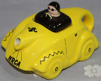 Alternate angle of Yellow NRCA 2009 car ceramic juicer showing the driver