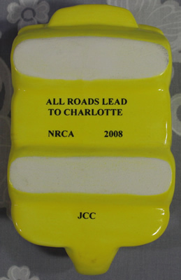 Base of Yellow NRCA 2009 car ceramic juicer