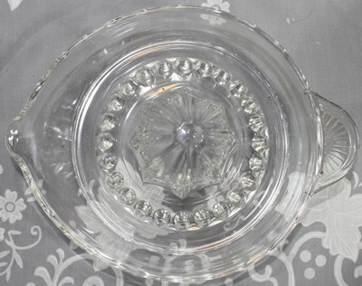 Top view of a Borgonovo Italy clear glass juicer