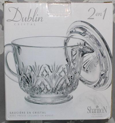 The box with a 2 piece Dublin Cristal clear glass juicer