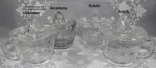 4 different 2 piece clear glass juicers