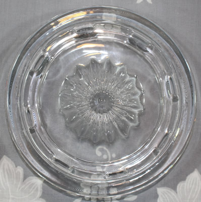 The reamer for a 2 piece Heaven in Earth clear glass juicer