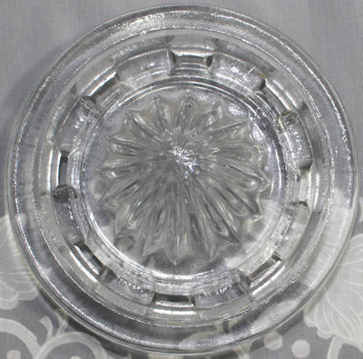 The reamer for a 2 piece reproduction clear glass juicer
