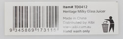 The bar code label on a 2 piece Tara Dennis white milk glass juicer