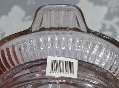The barcode under the handle of a Chinese pink glass juicer sold by Woolworths (Australia) in 2006