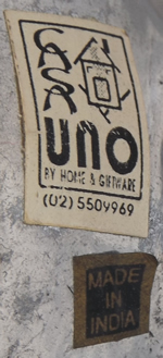 The label on a hinged cast aluminium squeezer