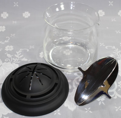 The 3 parts of an Avanti stainlees steel, plastic and glass juicer