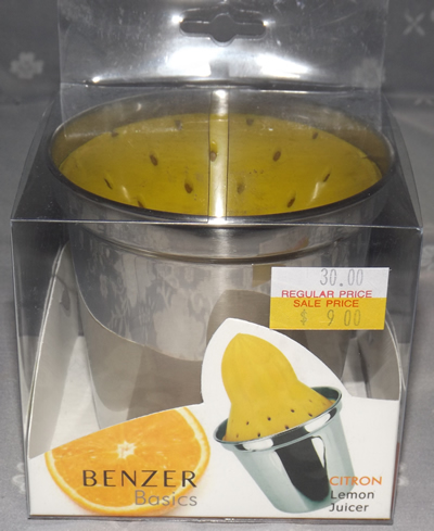 A packaged Benzer yellow plastic and stainless steel juicer 