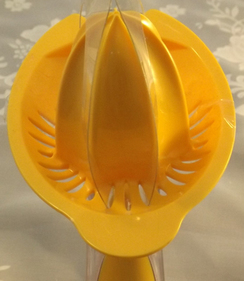 Top view Orange plastic Progressive juicer