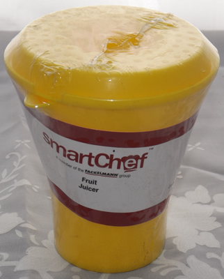 A packaged yellow smartChef juicer