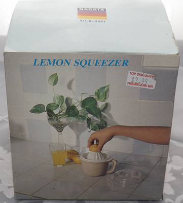 Box Green plastic juicer on jug with lid
