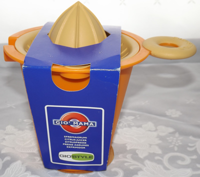 Orange & Cream plastic juicer with donnut grip packaged