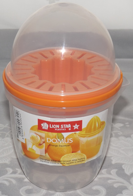 Orange top Domus 3 piece plastic juicer closed