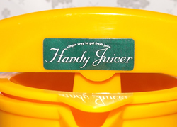Handy Juicer yellow sqeezer pot juicer label