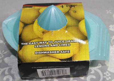 The Home Chef version of a translucent pale blue plastic juicer