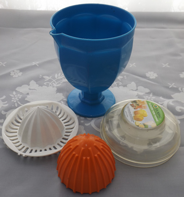 4 parts of Blue, orange, white & clear plastic goblet juicer