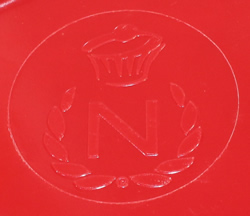 Embossed base mark on red melamine Nigella Lawson juicer