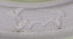 Buffalo potter's mark on beige Australian pottery saucer juicer 