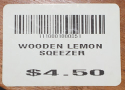 Bar code label on the hinged "WOODEN LEMON SQEEZER" hand held squeezer 