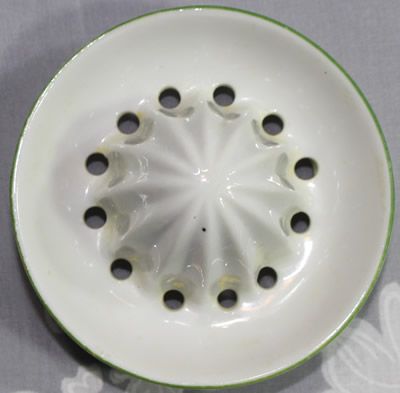 The reamr for a shades of green bands on white juicer