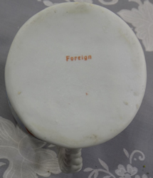 Foreign basemark on an orange with blue hat black collar1 piece toby juicer 