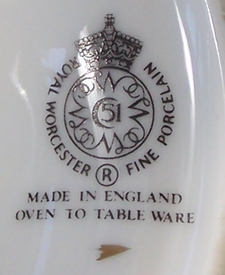 Basemark on a white with gold band Royal Worcester saucer shape juicer