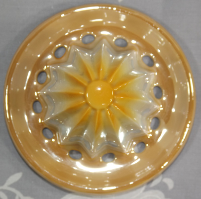 Pink flower on white with gold lustre reamer 