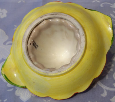 Yellow bottom of red & yellow with green leaves juicer