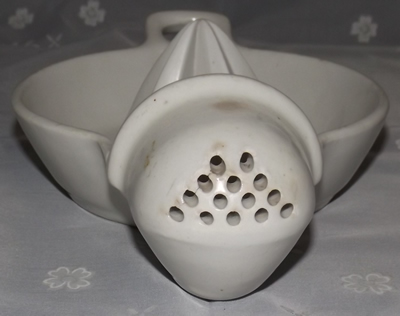 Strainer holes on a 10" Corns China strainer juicer