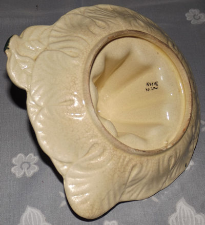 Base of a Japanese pink and green on cream juicer