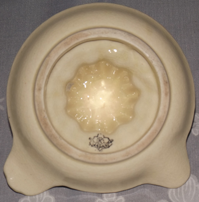 Base of a Japanese yellow flowers brown trim juicer