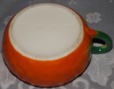 Base of Orange Beswick juicer 