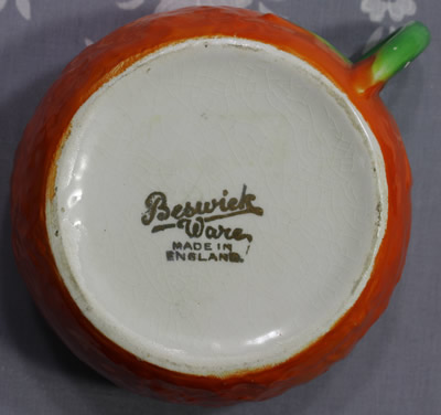 Base of Orange Beswick Ware juicer 