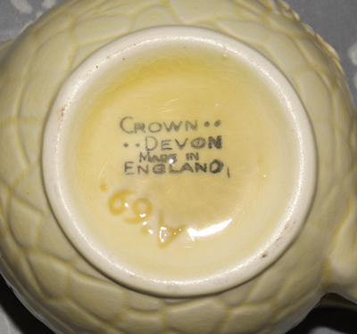 Base marks Crown Devon flower juicer
